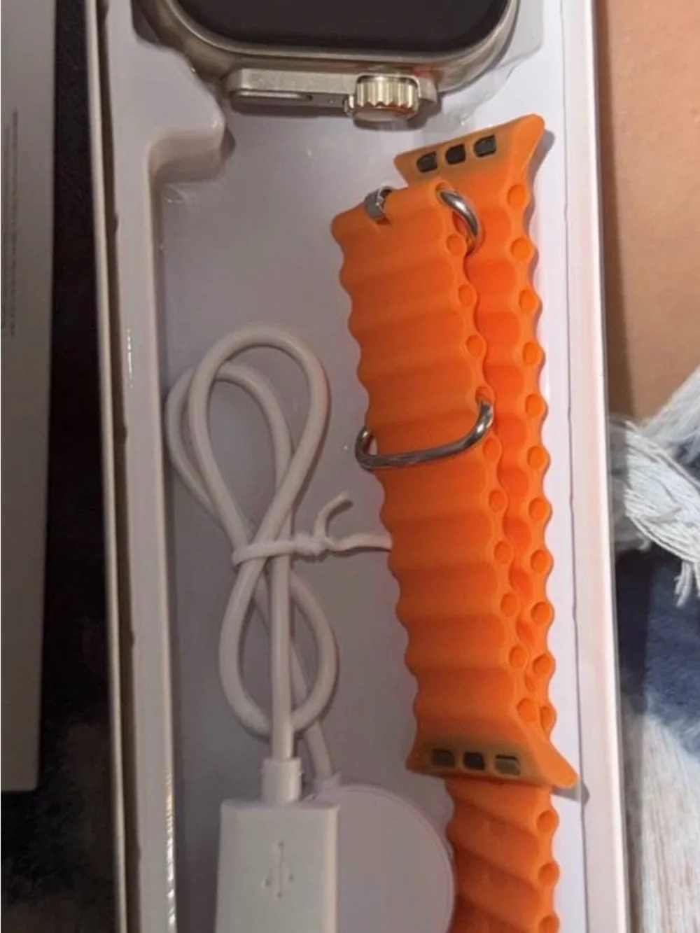 Smartwatch with Orange Sport Band and Silver Case - Sleek Touchscreen Wearable
